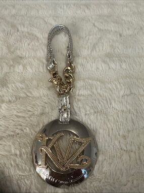 Kathy Van Zeeland Silver and Gold Metallic Logo Key Chain